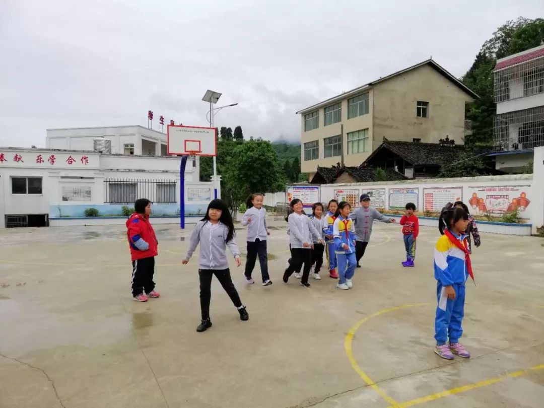 OCAC and Changguansi students playing soccer together